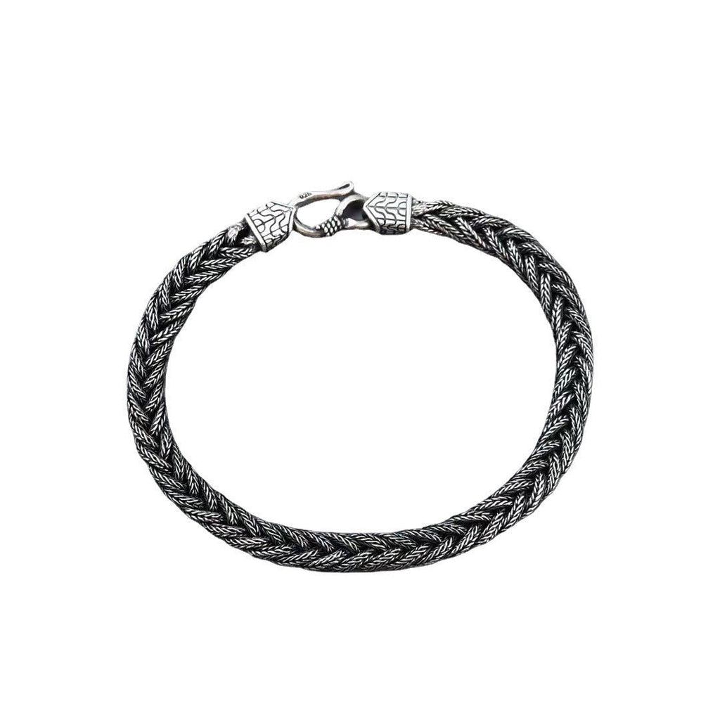 BoxUnboxed Sovereign Viking Vajra braided link chain bracelet in solid 925 sterling silver with oxidized patina and hook clasp.